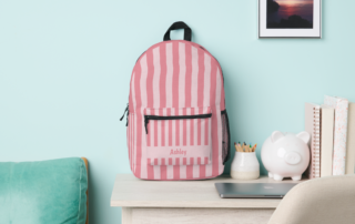 Personalized Name Light Pink Striped Kawaii Style Backpack with custom name panel, pink vertical stripes, black straps and side mesh pocket.-pink backpack-pink customizable backpack-pink dramatic backpack
